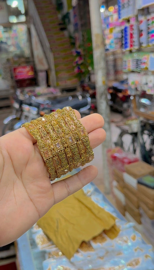 Gold plated (7pc) bangles (Bg406)
